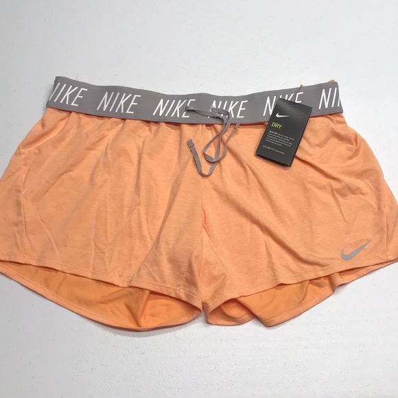 orange nike shorts womens